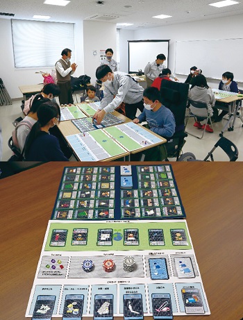 Local residents enjoying the board game